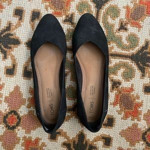 Black suede Tom’s flats